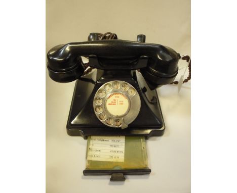 A VINTAGE GPO BLACK BAKELITE CASED TELEPHONE, with fitted index drawer, stamped hand piece G.P.O. No.164, PL34