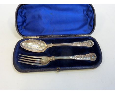 A CASED VICTORIAN SILVER CHRISTENING SET, London 1868, comprising a fork and spoon moulded and bright cut with roses, approxi