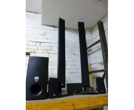 AN LG SURROUND SOUND, with five speakers and a sub woofer