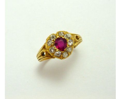 A VICTORIAN RUBY AND DIAMOND RING, the heart shape ruby within a surround of old cut diamond within a heart shape, hallmarks 