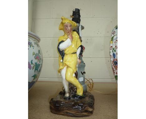 A JESTER TABLE LAMP, height 28cm
