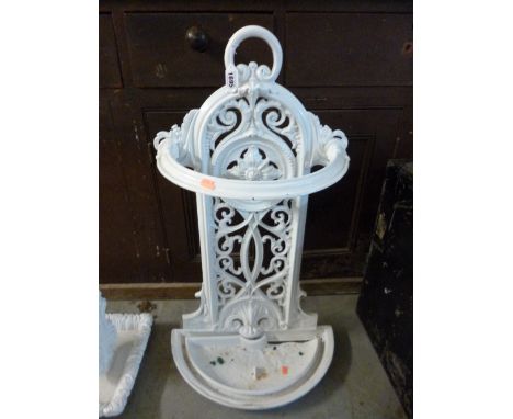 A PAINTED CAST STICK/UMBRELLA STAND, (lower drip tray broken)