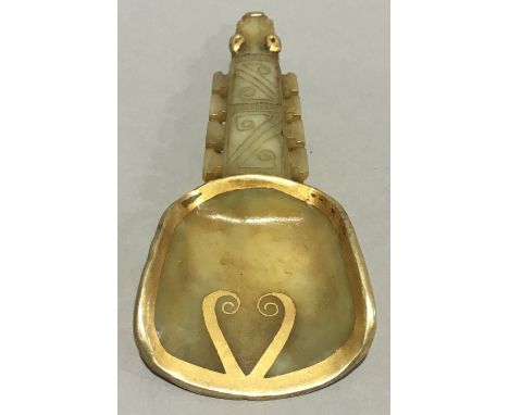 A Chinese gilt heightened jade spoon