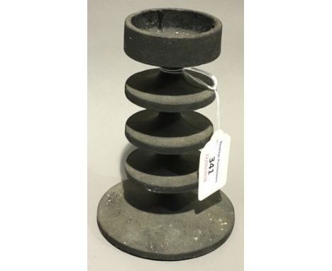 A Robin Welch modernist cast metal candlestick, as selected for the Design Centre, London
