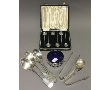 A set of six coffee bean spoons, Birmingham 1937; four silver spoons, Exeter, mid 19th century; a silver caddy spoon, Sheffie