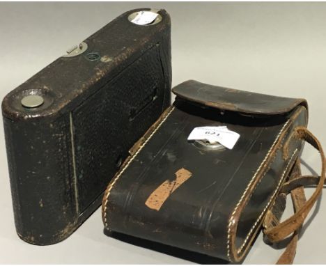 A Kodak No.3 folding pocket camera, model G, together with a Zeiss Ikon folding camera 520/2