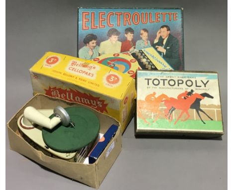 A Bingola 1 child's tin plate record player, together with a boxed Electroulette game and a boxed Totopoly game