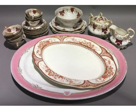A Victorian porcelain tea service and two Victorian meat plates