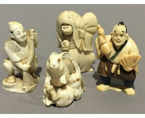 Three late 19th/early 20th century carved ivory netsuke and an ivory figure