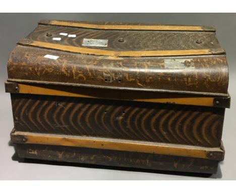 A Victorian tin trunk containing various interesting items
