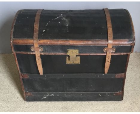 A French au depart leather bound trunk with fitter interior and old paper label