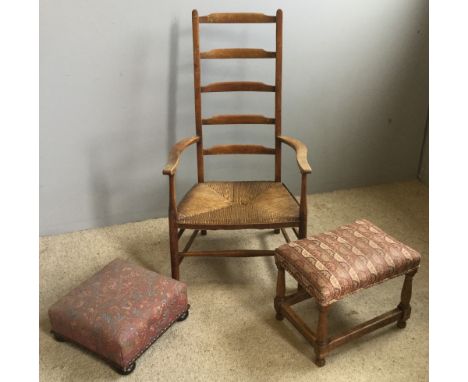 A rush seated ladder back chair and two foot stools