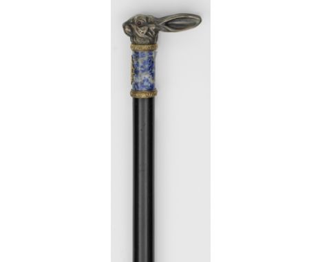 Zierstock mit figürlichem Knauf in der Art von Karl Fabergé. Silber, teilw. vergoldet, ebonisiertes Holz und Marmor. Vollplas