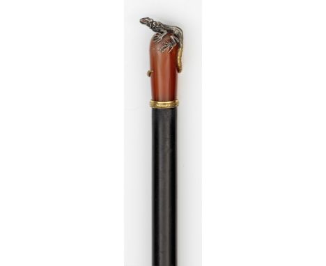 Spazierstock in der Art von Karl Fabergé. Karneol, Silber und ebonisiertes Holz. Auf dem konischen Griff eine sich herumschli
