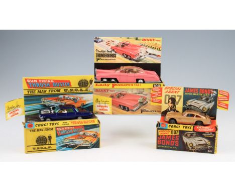 A group of three boxed TV related deists to include; Corgi Toys 261 James Bond 007 Aston Martin DB5 and 497 The Man from U.N.