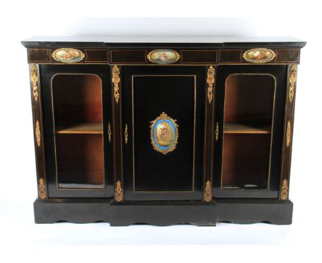 An early 20th Century ebonised break front credenza with boxwood inlaid string edging and ormolu decorations, the central doo