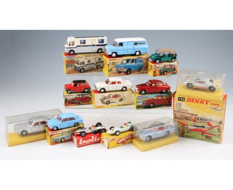 A group of eight Dinky toys diecasts to include; 162 Triumph 1300 in light blue, 342 Austin Mini Moke in dark green, 159 Ford