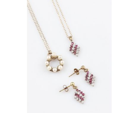 A 9ct yellow gold ruby and cubic zirconia pendant, set into a diamond shaped mount with four diagonal rows of alternating rou