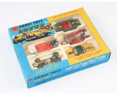 A Corgi Toys Gift Set 37 Lotus racing team set comprising of Lotus-Climax racing car, Lotus Elan coupe, Lotus Elan S.2, Volks