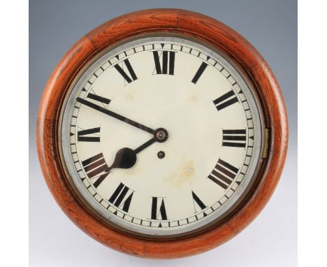 A Victorian circular oak hanging wall clock with fusee movement with white enamel dial having black Roman numeral hourly mark