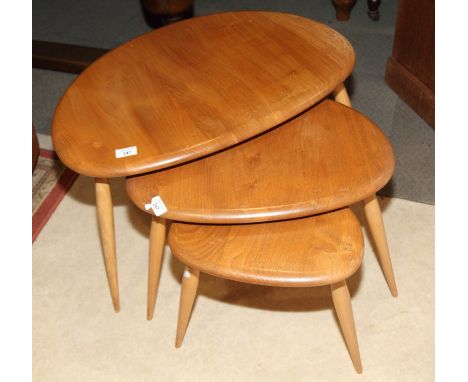 A nest of three Ercol "Pebble" coffee tables