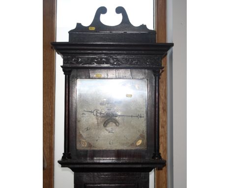 A 19th Century long case clock in oak and mahogany banded case with later scroll pediment, painted dial with thirty-hour move