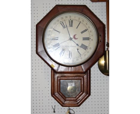 A late 19th Century drop dial wall clock with octagonal dial by Seth Thomas, 24" high