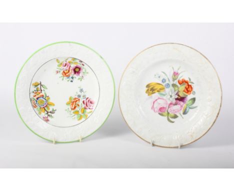 Two New Hall bone china relief decorated plates, one floral and one pattern number 1742