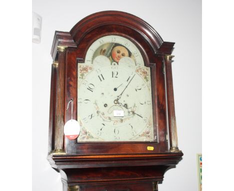 An 18th Century long case clock in mahogany case, arched top hood with reeded and fluted pilasters, eight-day movement with p