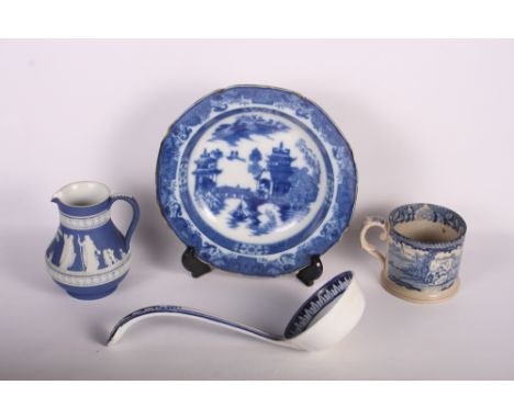 A 19th Century Willow pattern soup bowl, a blue and white mug with transfer decoration of a milk maid, a soup ladle and a Wed