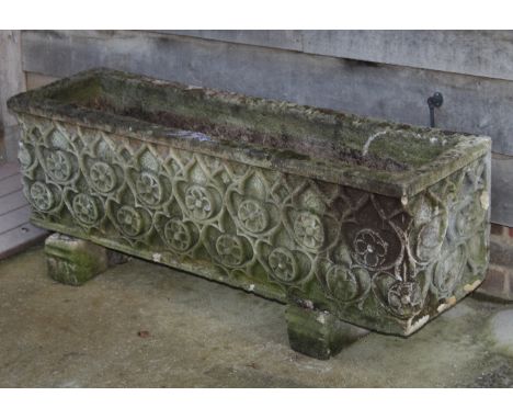 A cast planter, side moulded Tudor style floral decoration, 51" x 14"