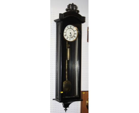 A Vienna type wall clock with ebonised case