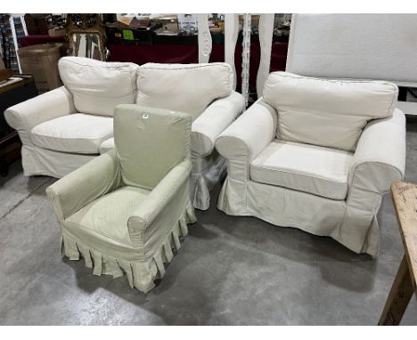 A loose covered sofa with matching armchair, together with a 1930s armchair