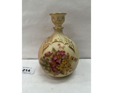 A Worcester blush ivory globular vase, painted with summer flowers in enamels and enriched with gilding. c.1910. 5' high