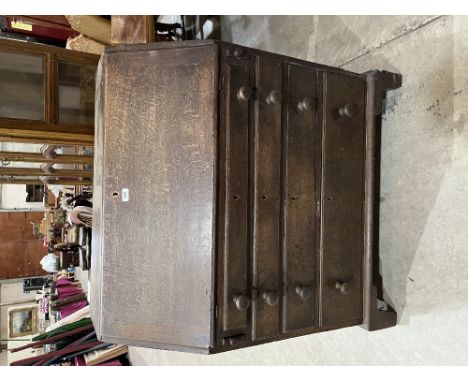 An 18th century oak writing bureau, the sloping fall over four drawers on bracket feet. 37' wide (Hardboard back)