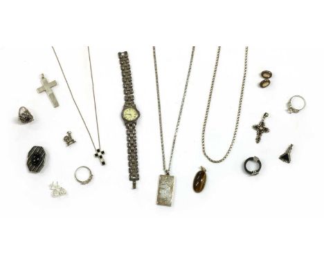 A quantity of silver jewellery, to include an ingot pendant, Birmingham 1977, a garnet set cross pendant, an onyx and mother-