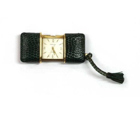 A Teriam 'Teriamatic' mechanical purse watch, c.1955, with a green alligator case and tassel, the square silvered dial with g