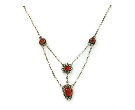 A Birmingham school Arts &amp; Crafts silver cornelian swag necklace, with buckle design clasp, 405mm long, together with a p