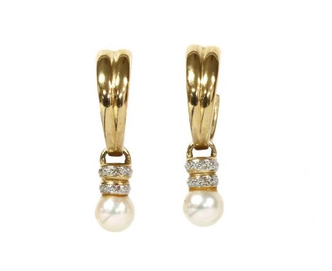 A pair of 14ct gold cultured pearl and diamond earrings, a fluted tapering hoop earring suspending a cultured pearl drop, the