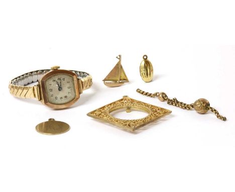 A quantity of gold jewellery, to include a 9ct gold sailing boat charm, London 1947, a 9ct gold sovereign pendant mount, Lond