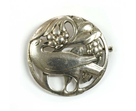 A Dutch silver brooch, by Hooijkaas, after the design by Georg Jensen, in the form of a stylised dove eating berries, with pi