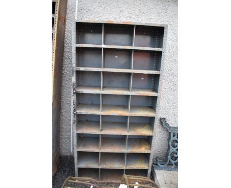 A 20th century metal cased industrial or garage shelf set