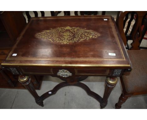 A late 18th century Regency design mahogany console table having inlayed and edged brass work