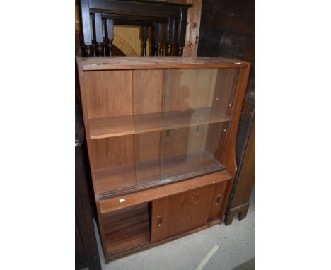 A vintage teak bookcase with cupboard under, nice proportions, width approx. 76cm