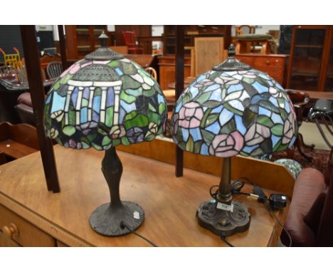 A matched pair of 20th century leaded light table lamps with metal bases