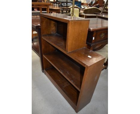 A mid 20th century mahogany three part book shelf