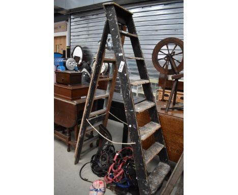 A set of 20th century decorators wooden step ladders