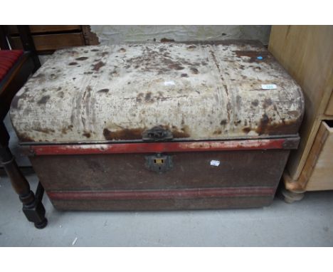 A metal tin trunk