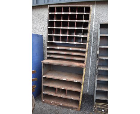 A 20th century metal cased industrial or garage shelf set