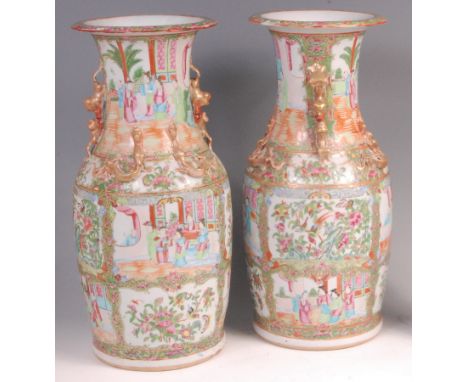 A pair of 19th century Chinese Canton famille rose vases, the waisted necks with applied and gilded mythical creatures, each 
